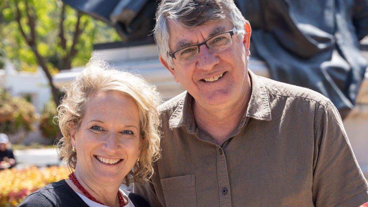 two teachers outside smiling